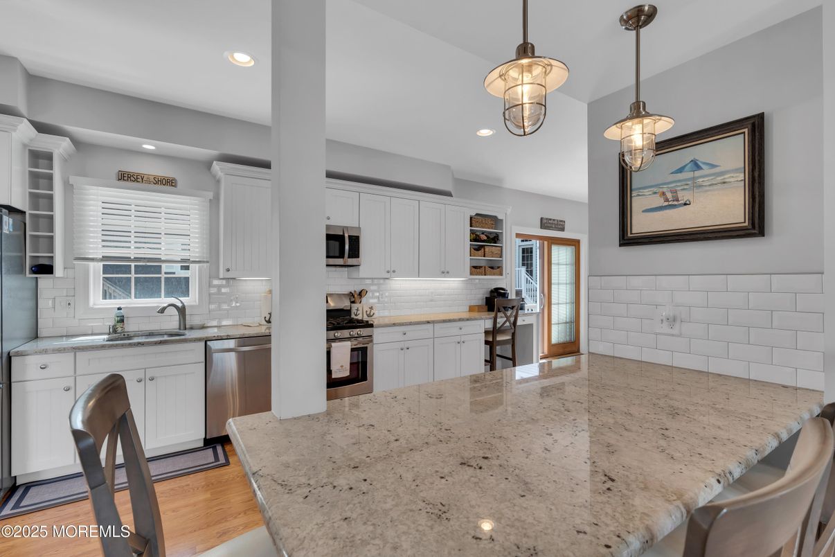 Interior, Kitchen, Pendant Lights, Recessed Lighting, Stainless Steel Appliances, Wood Texture Flooring