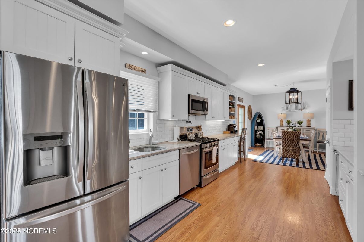 Dining room, Interior, Kitchen, Recessed Lighting, Stainless Steel Appliances, Wood Texture Flooring