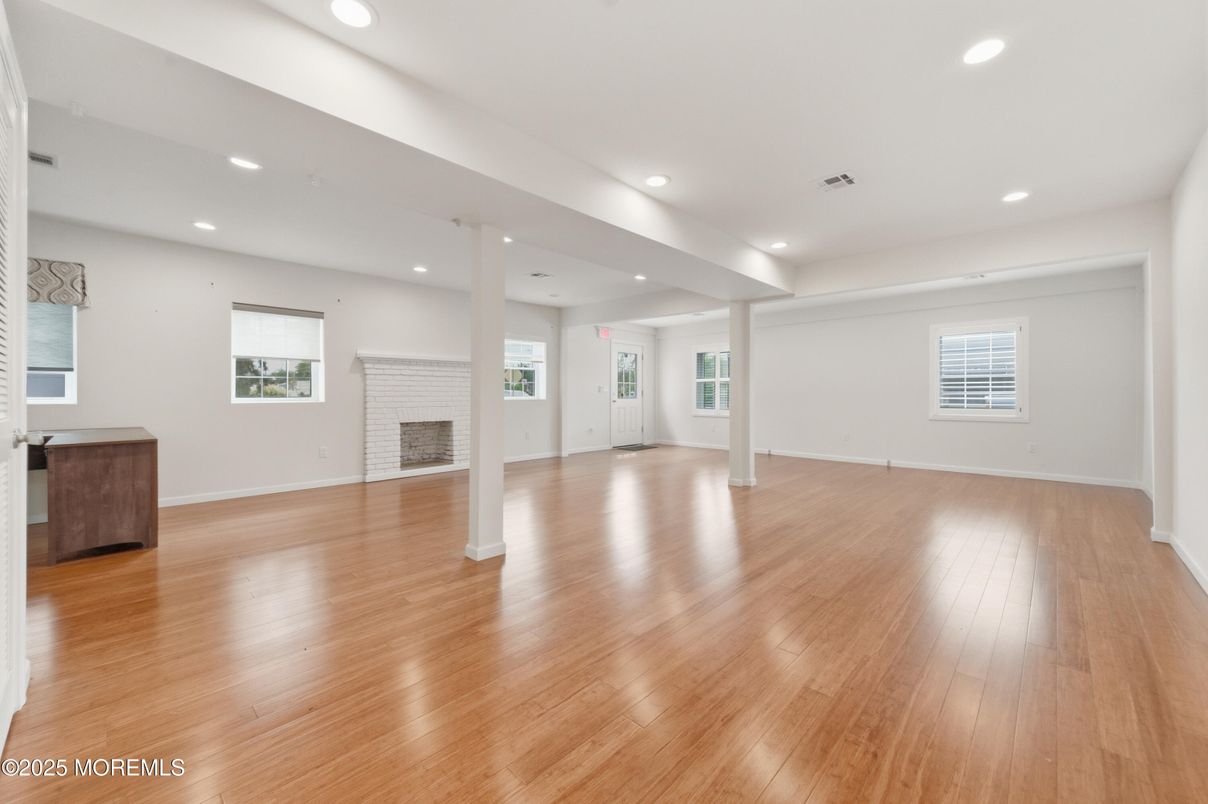 Empty room, Fireplace, Interior, Recessed Lighting, Wood Texture Flooring