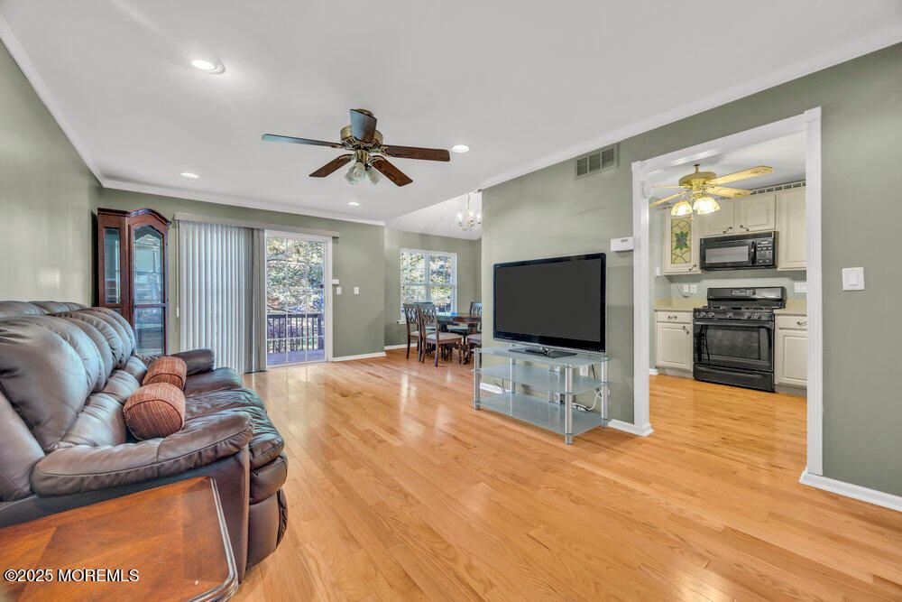 Chandelier, Dining room, Interior, Kitchen, Living room, Recessed Lighting, Wood Texture Flooring
