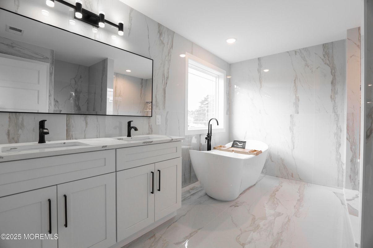 Bathroom, Dual Sink Vanities, Free Standing Baths, Interior, Marble, Marble Walls, Recessed Lighting