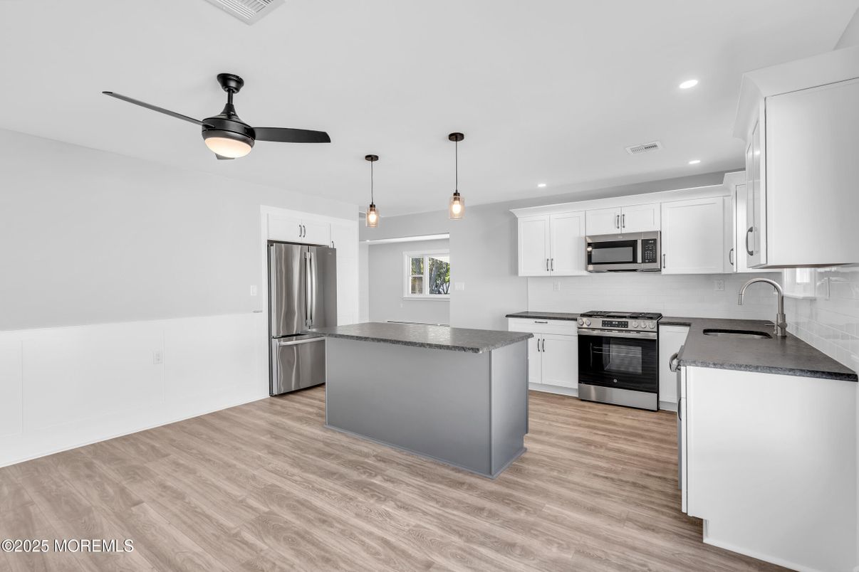 Interior, Kitchen, Pendant Lights, Recessed Lighting, Stainless Steel Appliances, Wood Texture Flooring