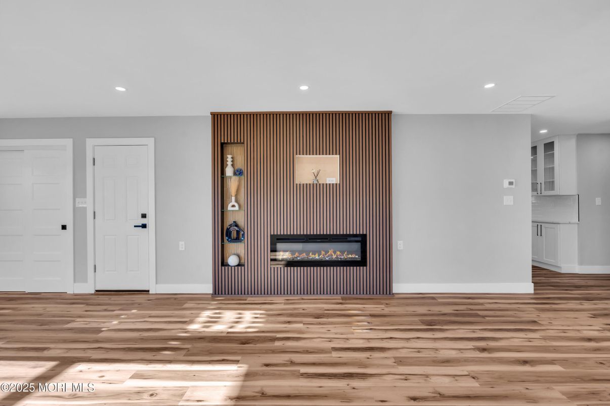 Empty room, Fireplace, Interior, Recessed Lighting, Wood Texture Flooring