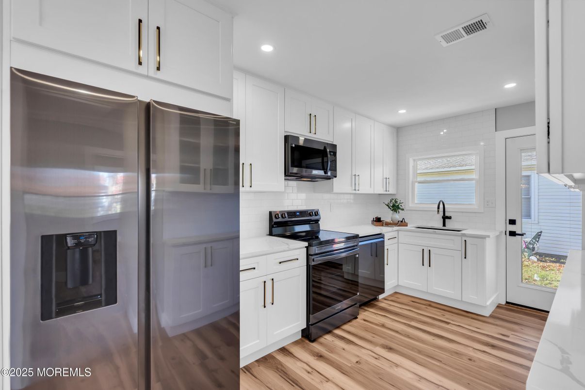 Interior, Kitchen, Recessed Lighting, Stainless Steel Appliances, Wood Texture Flooring