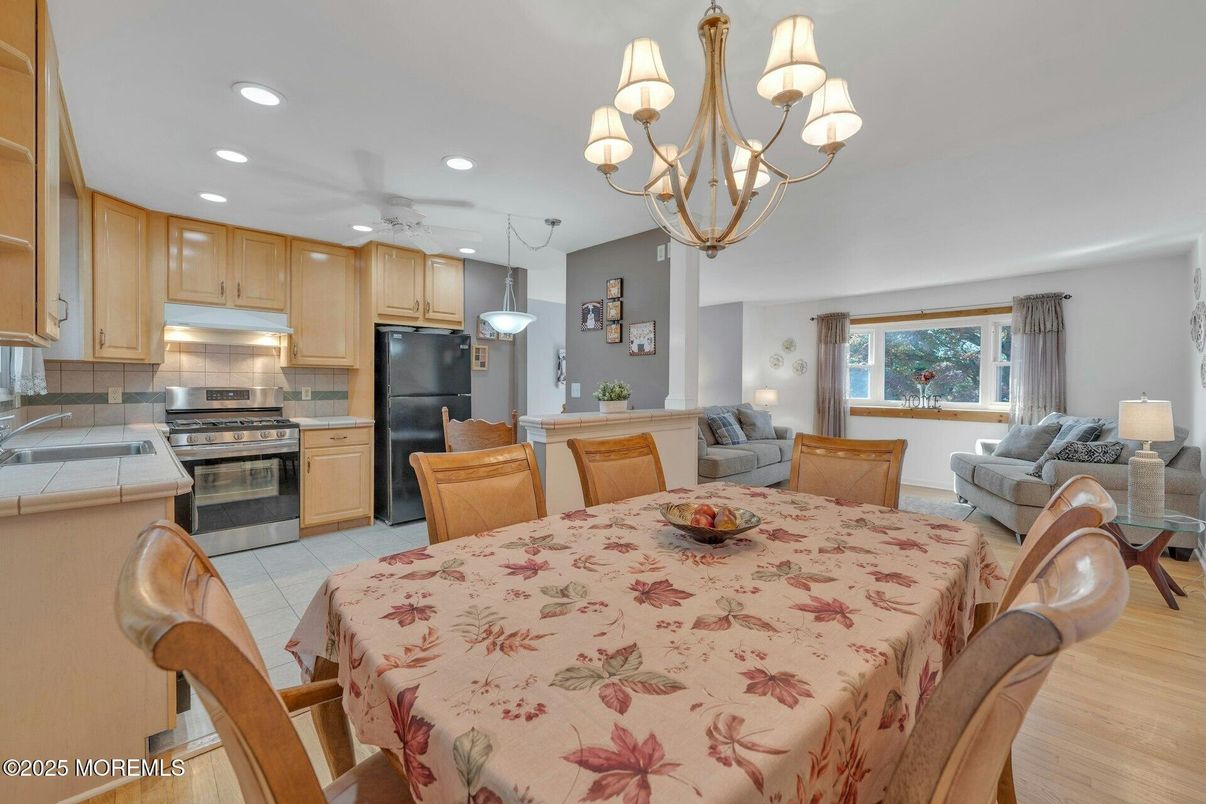 Chandelier, Dining room, Interior, Kitchen, Living room, Pendant Lights, Recessed Lighting, Wood Texture Flooring
