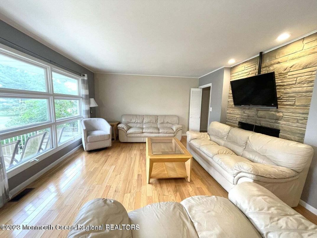 Interior, Living room, Recessed Lighting, Stone Walls, Wood Texture Flooring