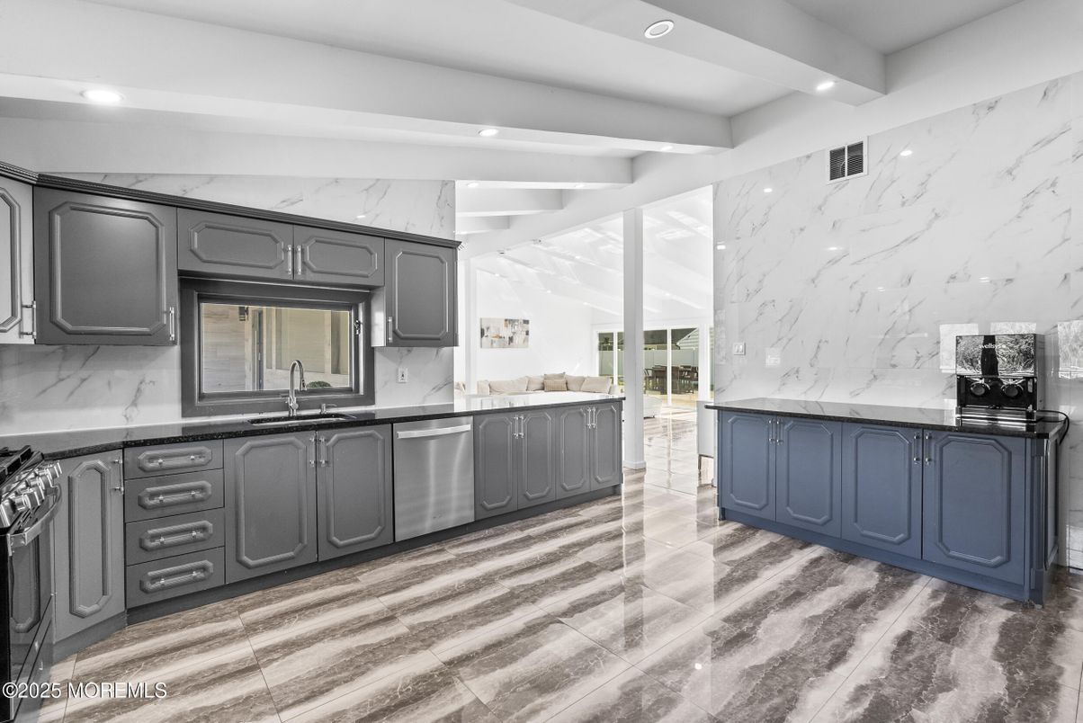 Interior, Kitchen, Marble Walls, Recessed Lighting, Stainless Steel Appliances