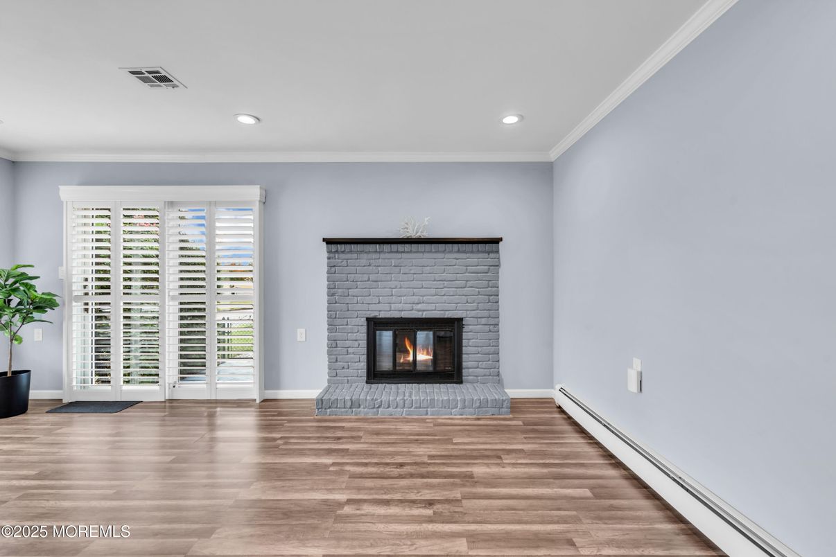 Empty room, Fireplace, Interior, Recessed Lighting, Wood Texture Flooring