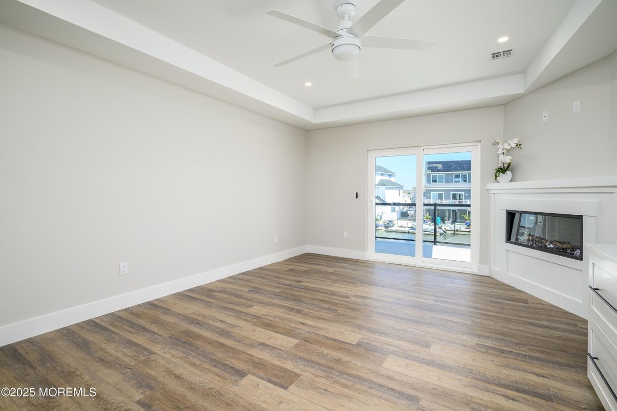 Empty room, Fireplace, Interior, Recessed Lighting, Wood Texture Flooring
