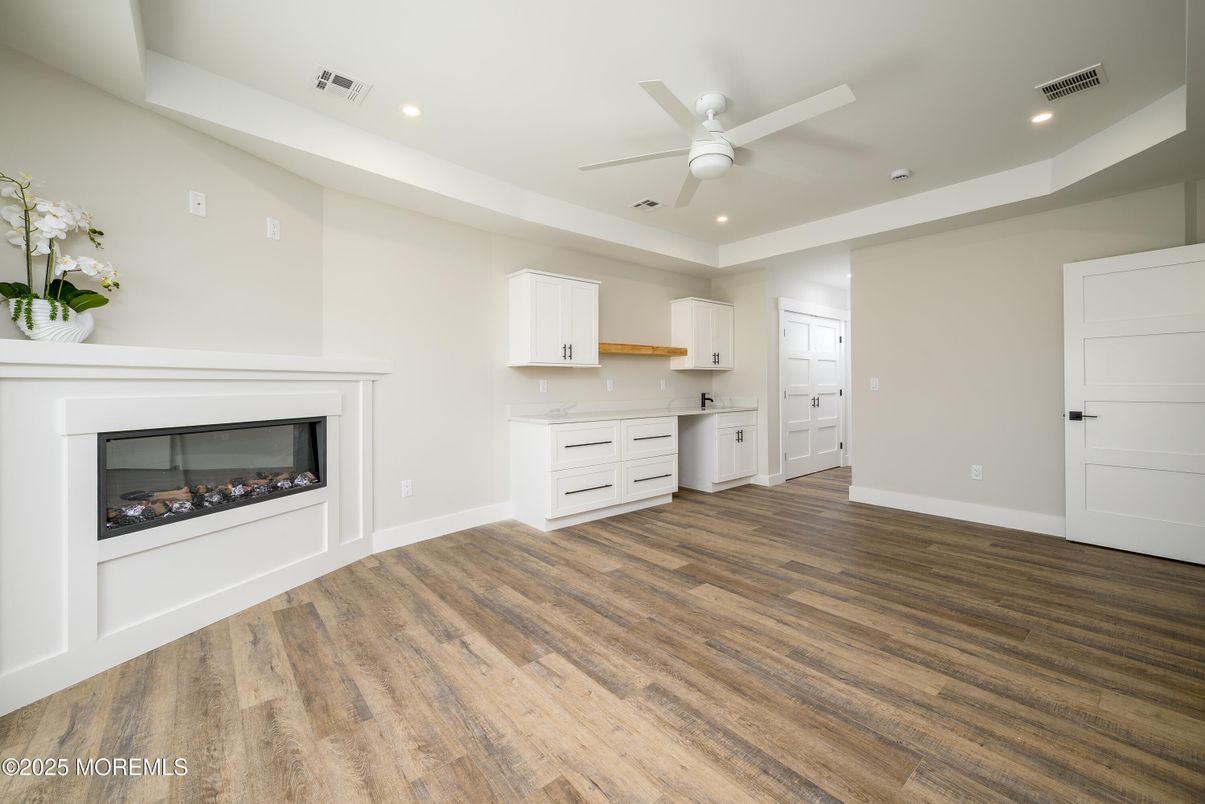 Empty room, Fireplace, Interior, Recessed Lighting, Wood Texture Flooring