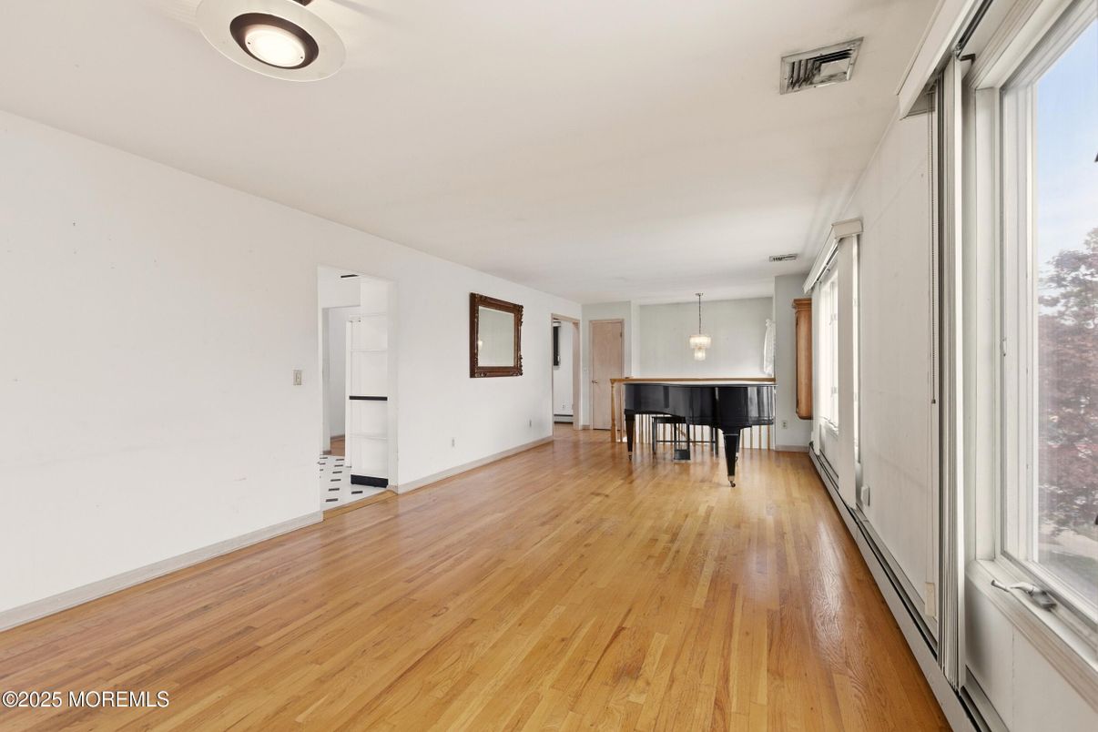 Dining room, Empty room, Interior, Pendant Lights, Piano, Wood Texture Flooring