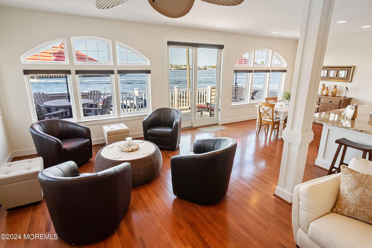 Dining room, Interior, Living room, Recessed Lighting, Water, Wood Texture Flooring