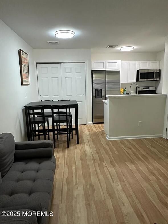 Dining room, Interior, Kitchen, Stainless Steel Appliances, Wood Texture Flooring