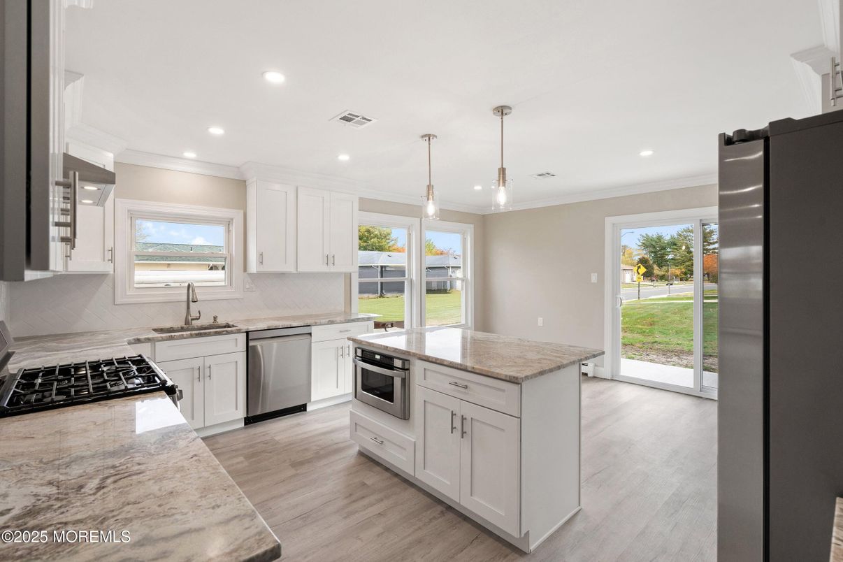 Interior, Kitchen, Pendant Lights, Recessed Lighting, Stainless Steel Appliances, Wood Texture Flooring