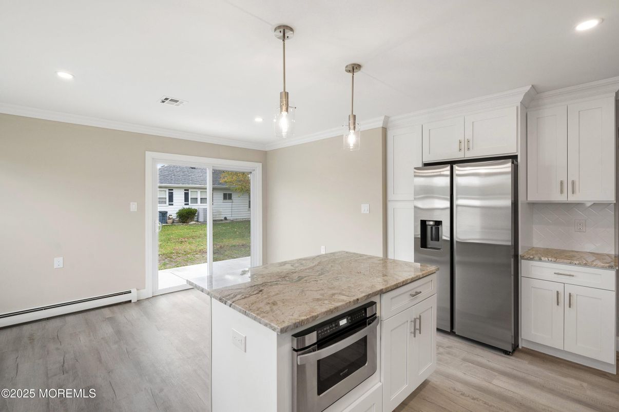 Interior, Kitchen, Pendant Lights, Recessed Lighting, Stainless Steel Appliances, Wood Texture Flooring