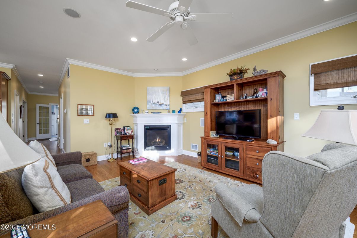 Fireplace, Interior, Living room, Recessed Lighting, Wood Texture Flooring