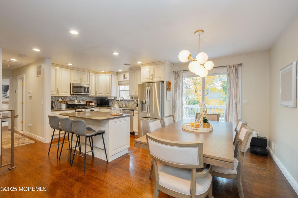 Dining room, Interior, Kitchen, Pendant Lights, Recessed Lighting, Stainless Steel Appliances, Wood Texture Flooring