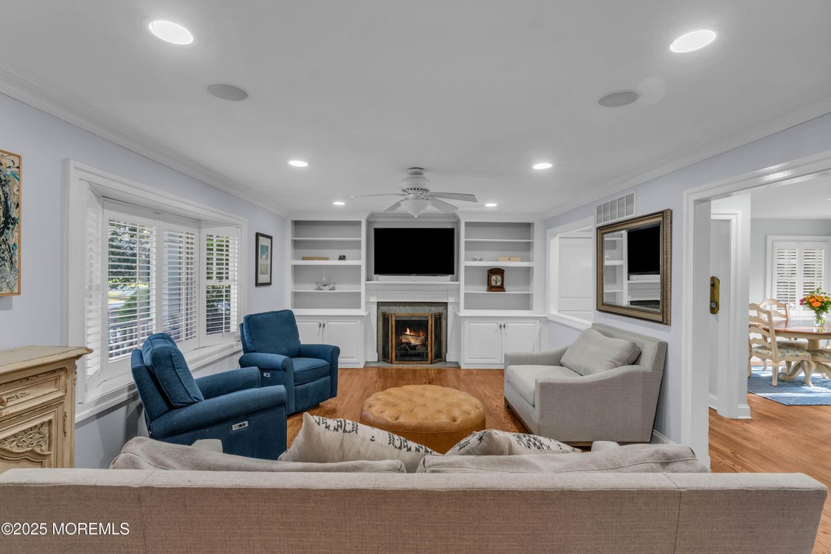 Dining room, Fireplace, Interior, Living room, Recessed Lighting, Wood Texture Flooring