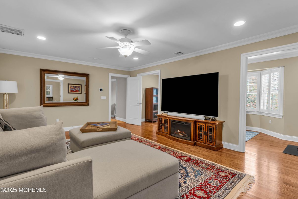 Fireplace, Interior, Living room, Recessed Lighting, Wood Texture Flooring