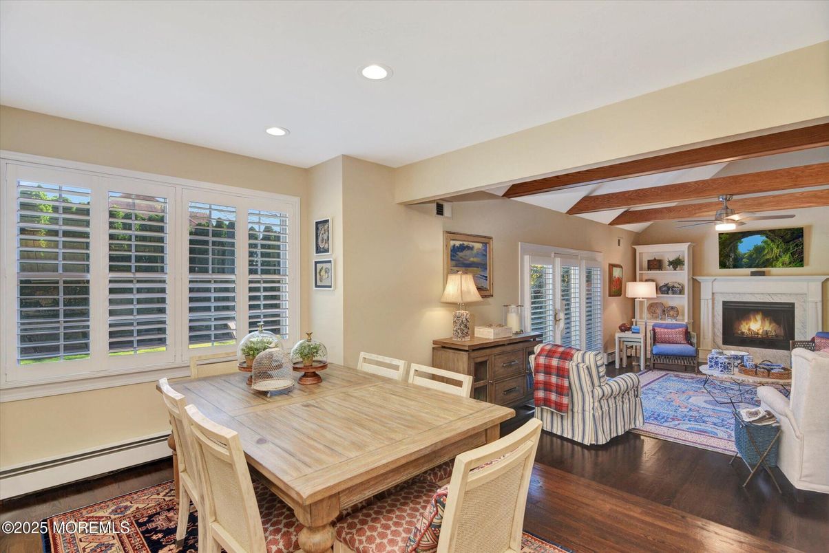 Dining room, Fireplace, Interior, Living room, Recessed Lighting, Wooden Beams, Wood Texture Flooring