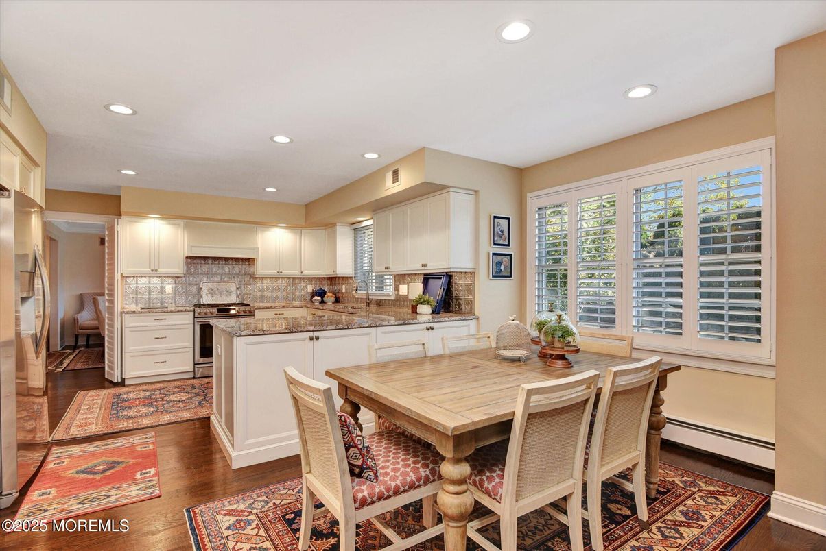 Dining room, Interior, Kitchen, Recessed Lighting, Stainless Steel Appliances, Wood Texture Flooring