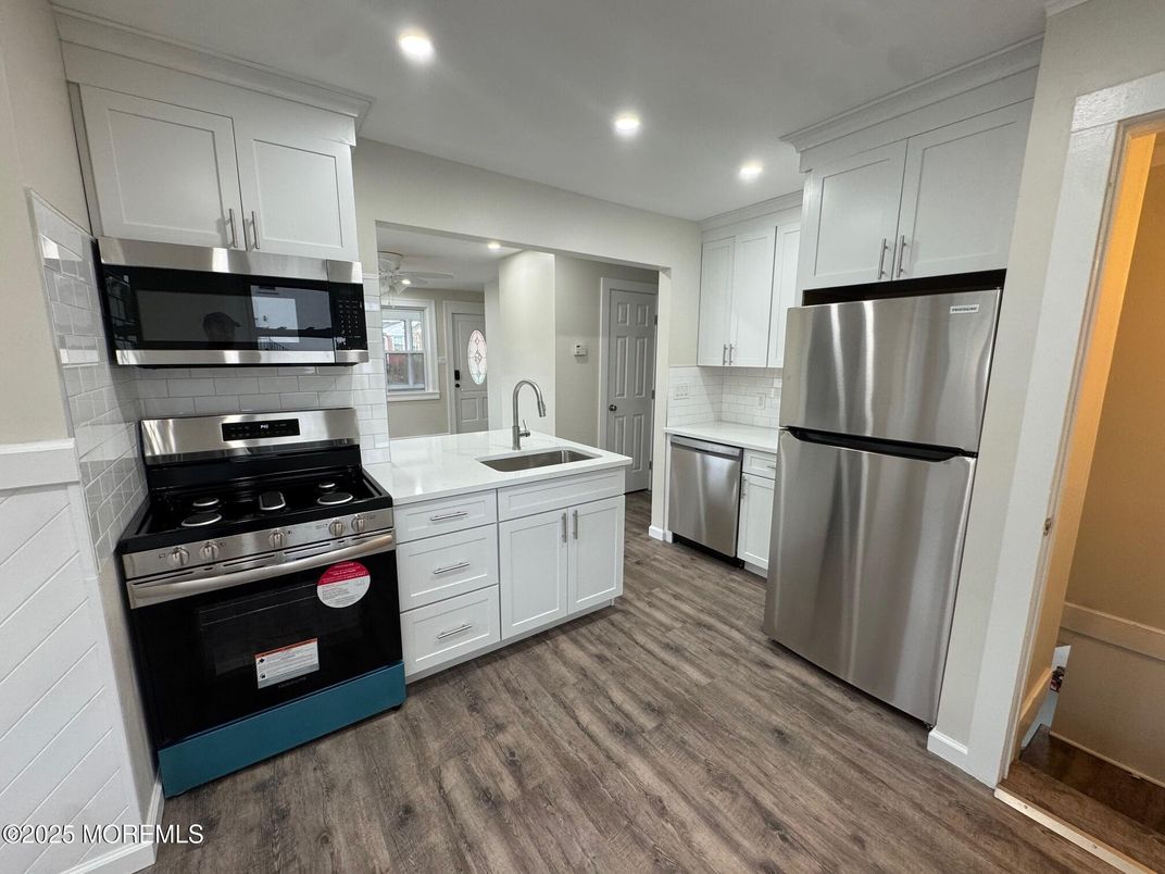 Interior, Kitchen, Recessed Lighting, Stainless Steel Appliances, Wood Texture Flooring