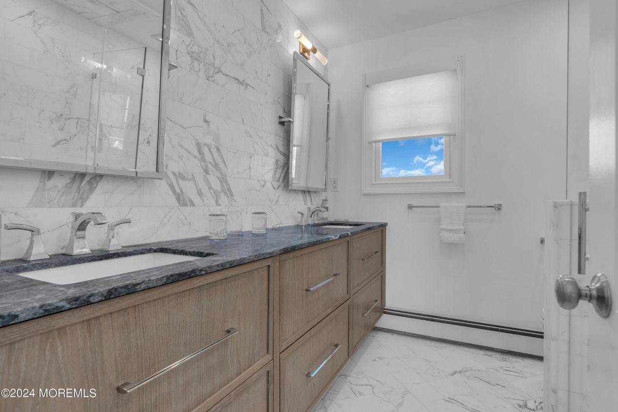 Bathroom, Dual Sink Vanities, Glass Shower, Interior, Marble, Marble Walls