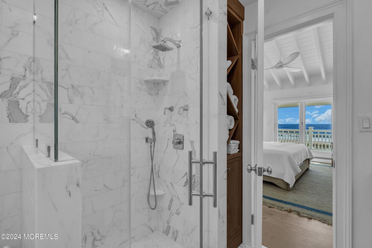 Bathroom, Bedroom, Glass Shower, Interior, Marble Walls, Water, Wood Texture Flooring