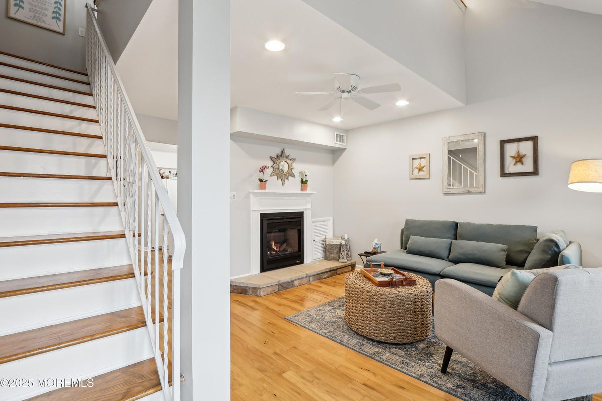 Fireplace, Interior, Living room, Recessed Lighting, Wood Texture Flooring