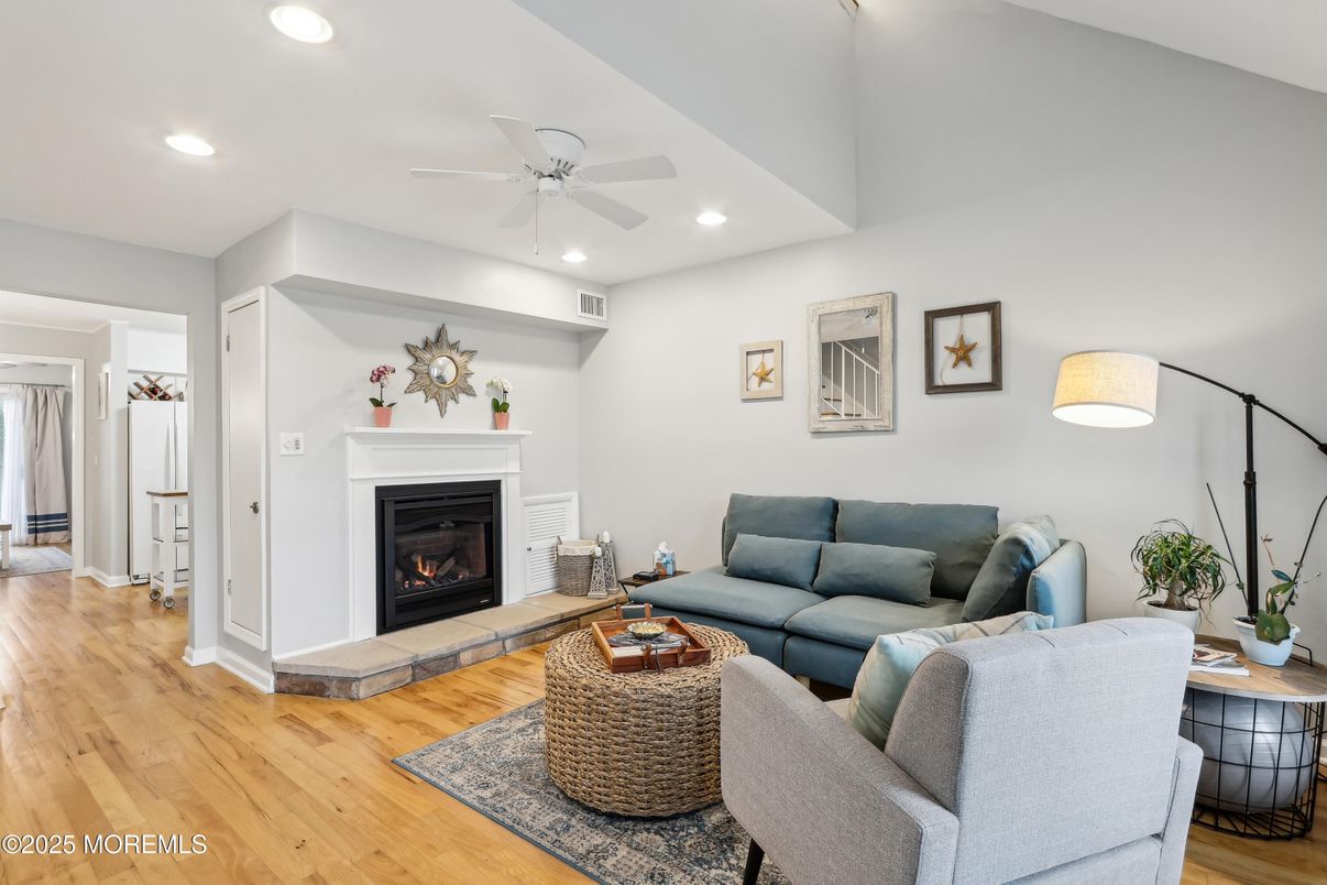 Fireplace, Interior, Living room, Recessed Lighting, Wood Texture Flooring