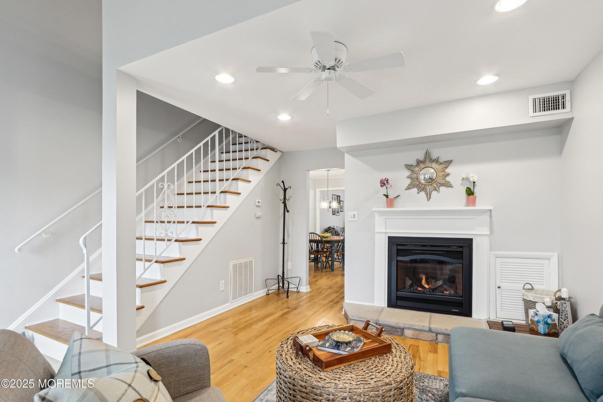 Fireplace, Interior, Living room, Recessed Lighting, Wood Texture Flooring