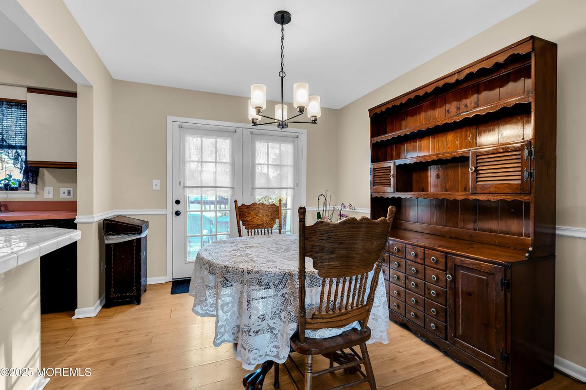 Chandelier, Dining room, Interior, Wood Texture Flooring