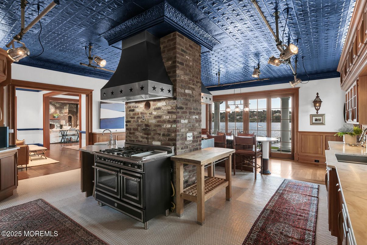 Dining room, Fireplace, Interior, Kitchen, Pendant Lights, Wood Texture Flooring