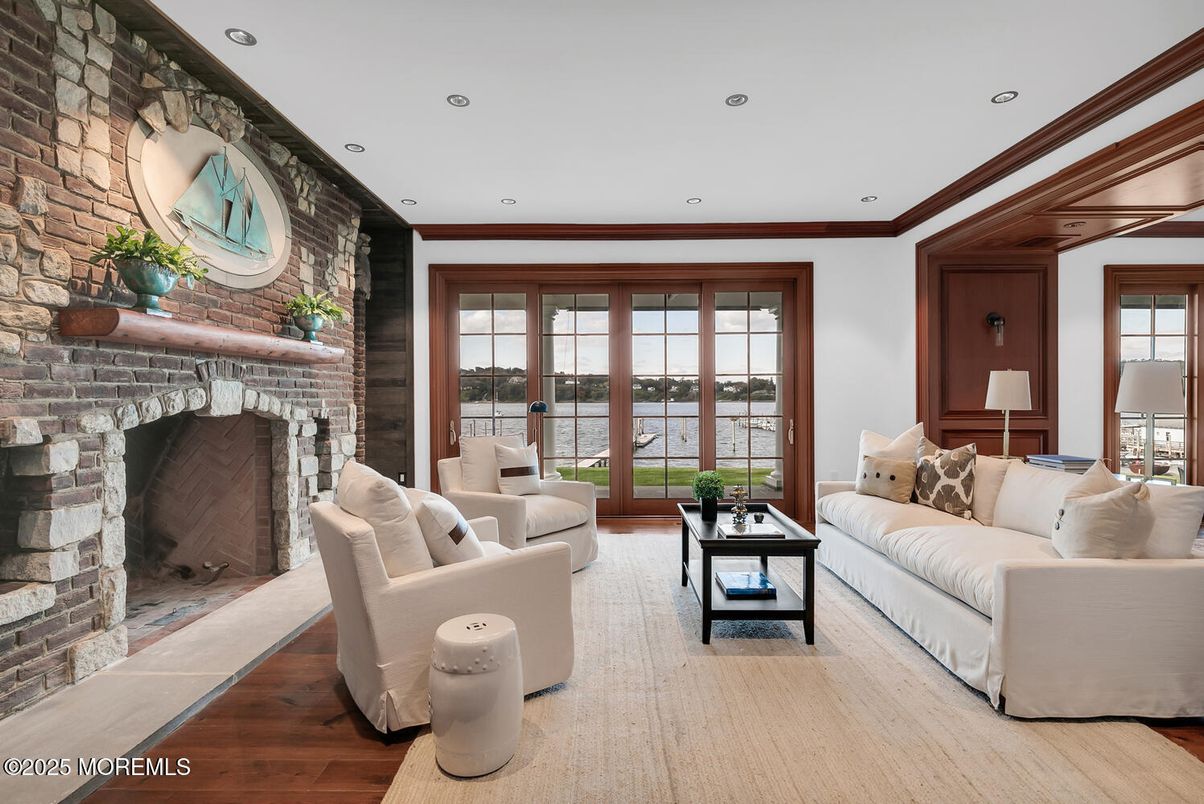 Fireplace, Interior, Living room, Recessed Lighting, Stone Walls, Wood Texture Flooring