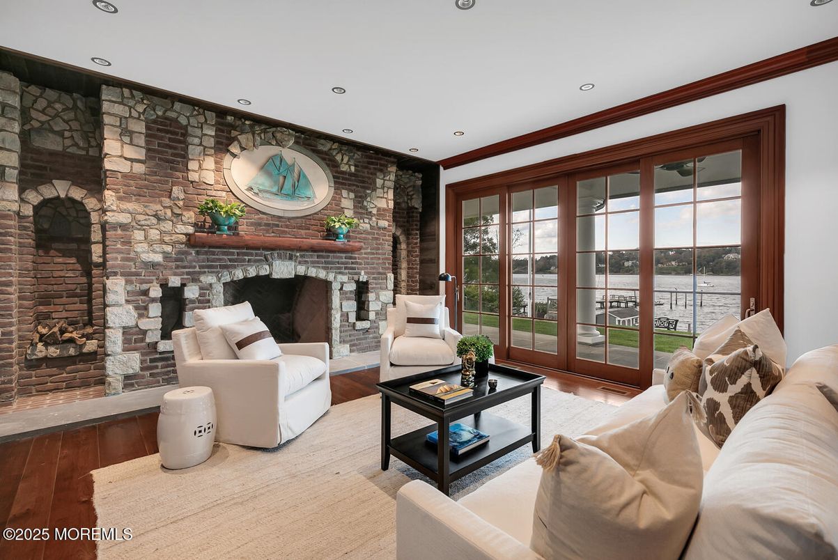 Fireplace, Interior, Living room, Recessed Lighting, Stone Walls, Wood Texture Flooring