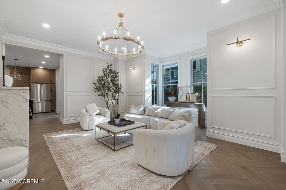 Chandelier, Interior, Kitchen, Living room, Pendant Lights, Recessed Lighting, Stainless Steel Appliances, Wood Texture Flooring