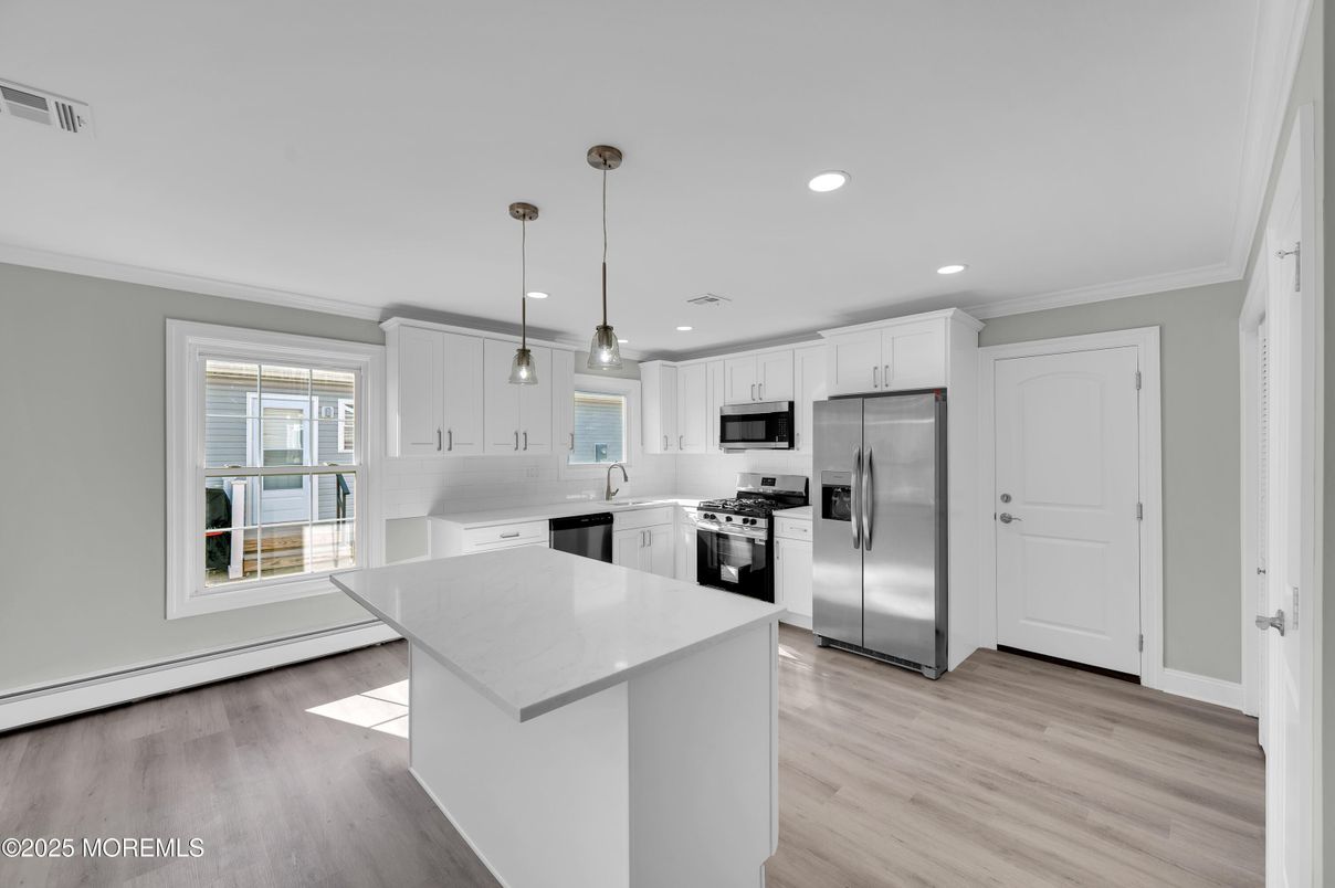 Interior, Kitchen, Pendant Lights, Recessed Lighting, Stainless Steel Appliances, Wood Texture Flooring