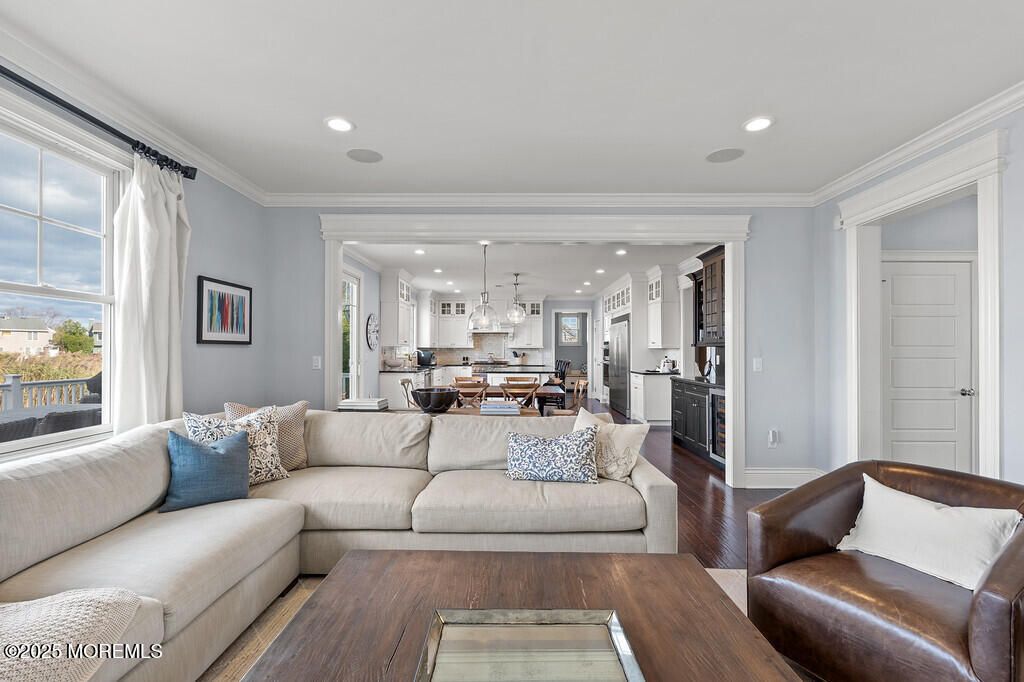 Dining room, Interior, Kitchen, Living room, Pendant Lights, Recessed Lighting, Stainless Steel Appliances, Wood Texture Flooring