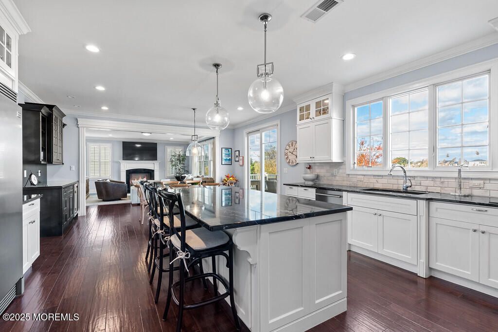 Fireplace, Interior, Kitchen, Living room, Pendant Lights, Recessed Lighting, Wood Texture Flooring