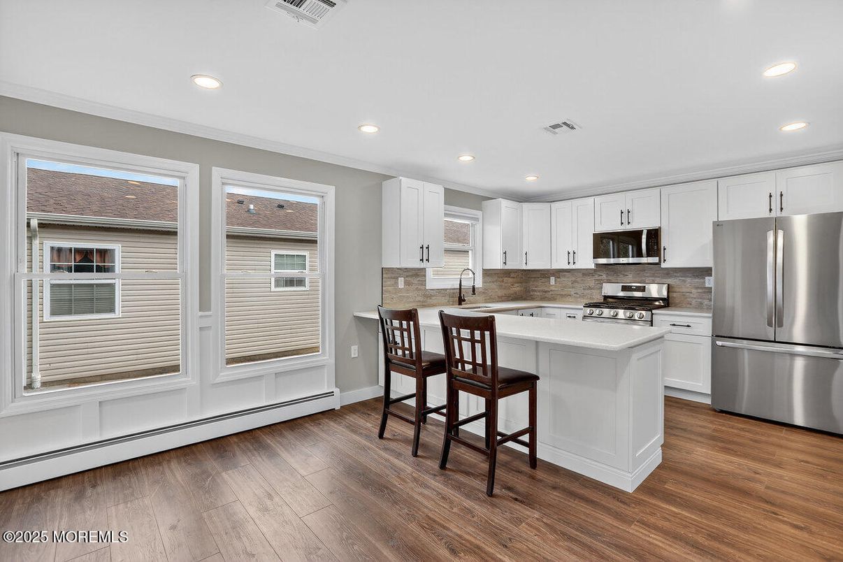 Interior, Kitchen, Recessed Lighting, Stainless Steel Appliances, Wood Texture Flooring