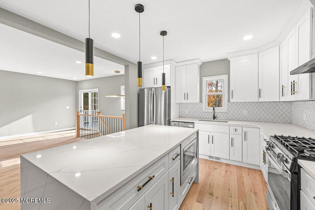 Interior, Kitchen, Pendant Lights, Recessed Lighting, Stainless Steel Appliances, Wood Texture Flooring