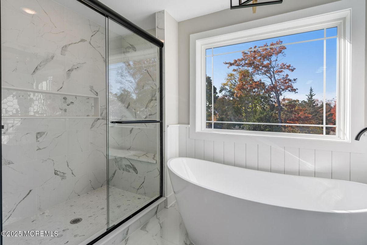 Bathroom, Free Standing Baths, Glass Shower, Interior, Marble, Marble Walls, Recessed Lighting