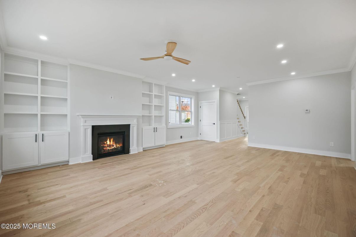Empty room, Fireplace, Interior, Recessed Lighting, Wood Texture Flooring