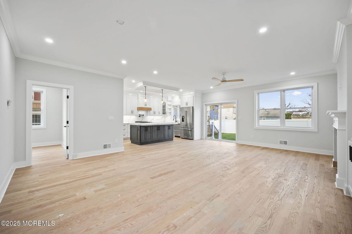 Empty room, Fireplace, Interior, Kitchen, Recessed Lighting, Wood Texture Flooring