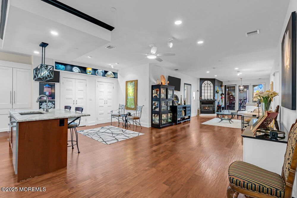 Fireplace, Interior, Kitchen, Pendant Lights, Recessed Lighting, Wood Texture Flooring