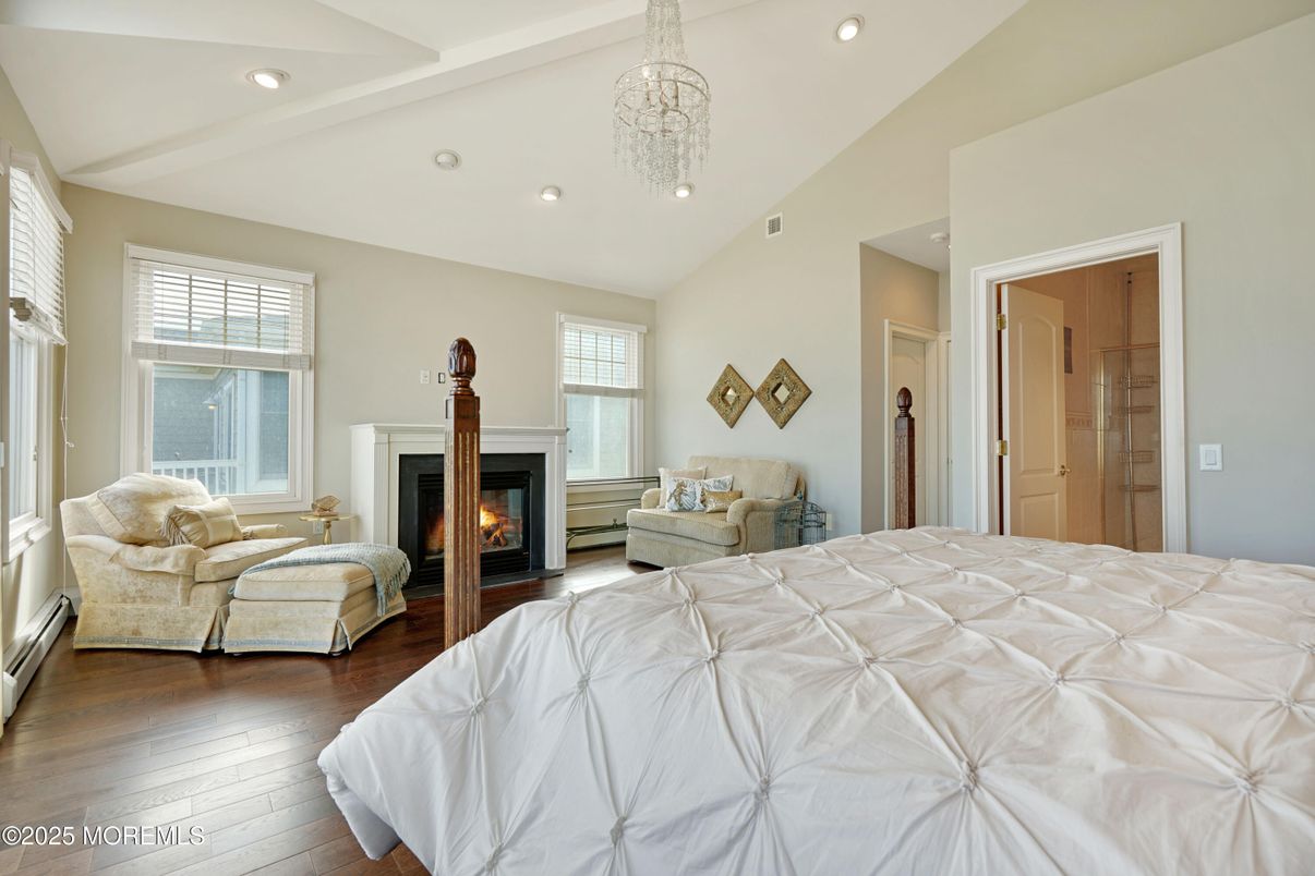 Bedroom, Chandelier, Fireplace, Interior, Pendant Lights, Recessed Lighting, Wood Texture Flooring