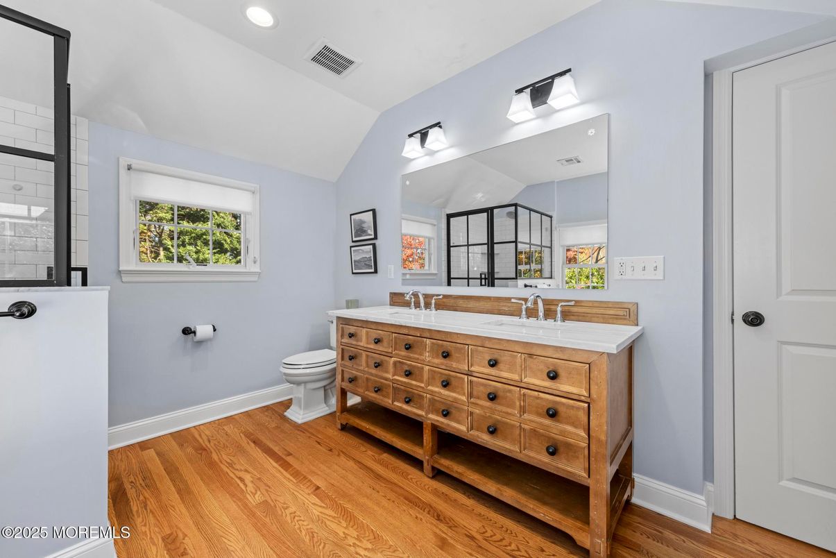 Bathroom, Dual Sink Vanities, Interior, Recessed Lighting, Wood Texture Flooring