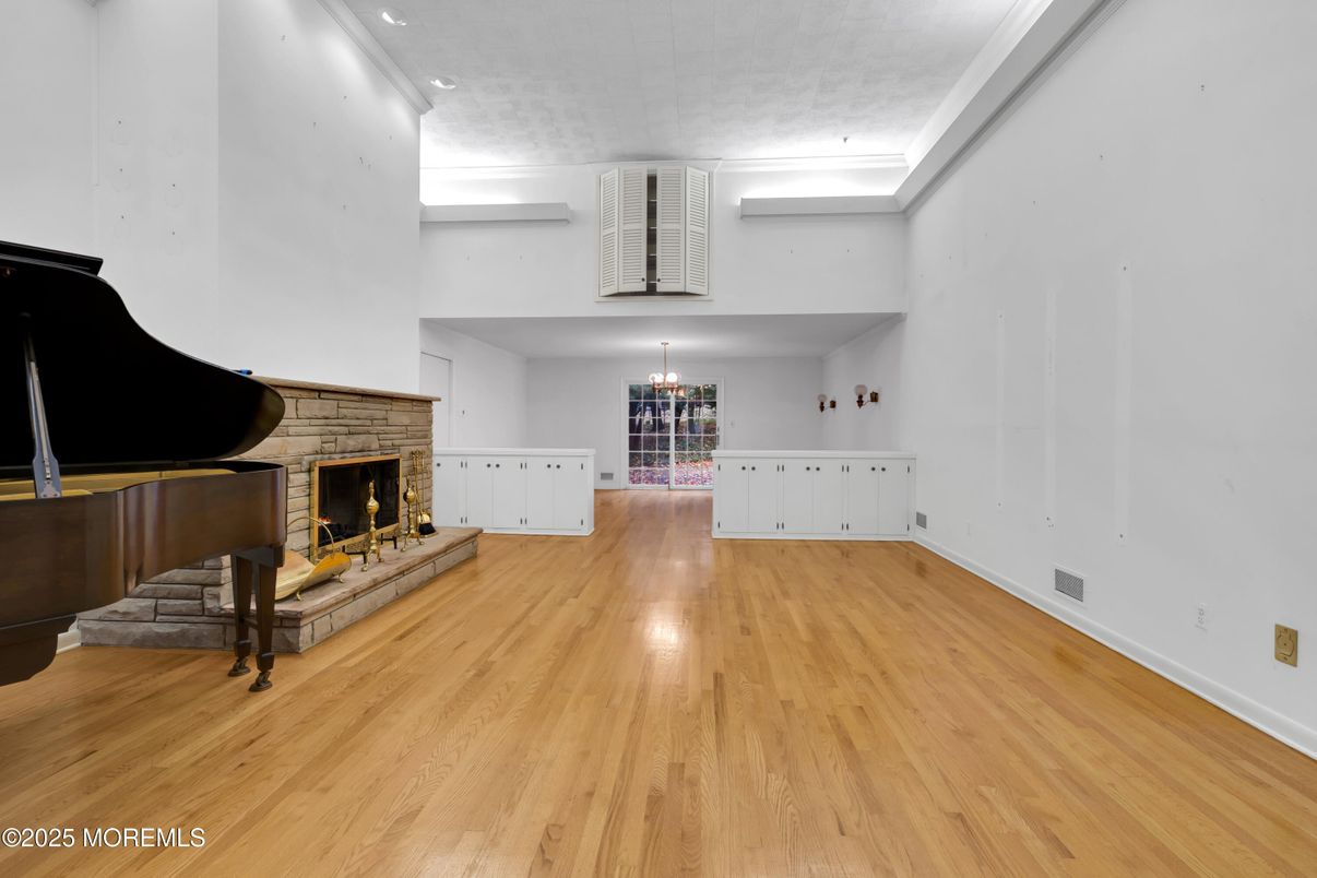 Fireplace, Interior, Piano, Recessed Lighting, Wood Texture Flooring