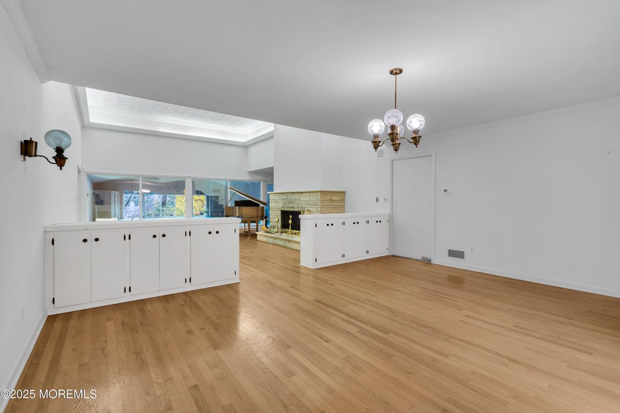 Chandelier, Empty room, Fireplace, Interior, Wood Texture Flooring