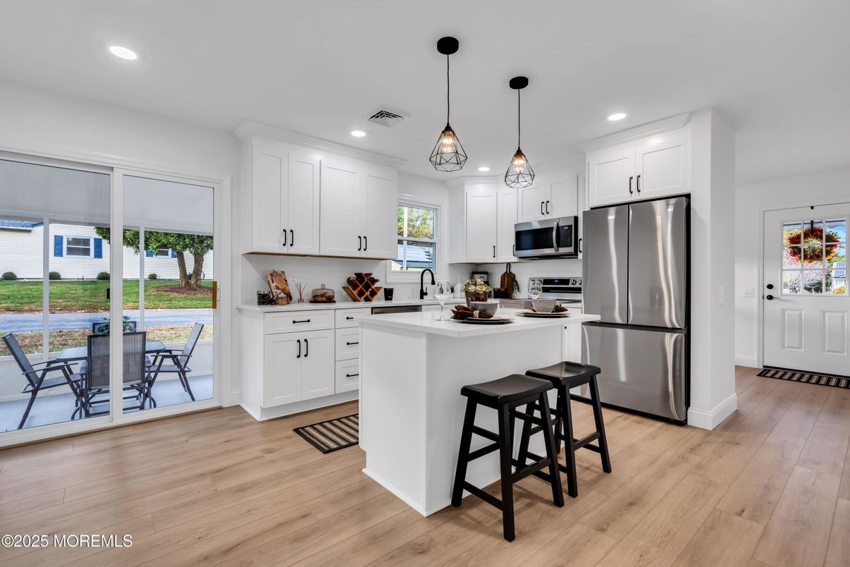 Interior, Kitchen, Pendant Lights, Recessed Lighting, Stainless Steel Appliances, Wood Texture Flooring